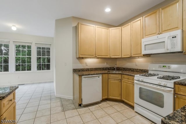 9 Apgar Ct, Raritan Twp, NJ 08822 - kitchen with white appliances, light tile patterned floors, dark stone counters, and light brown cabinets