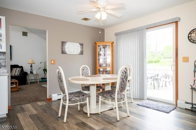 dining area featuring wood finished floors and a ceiling fan