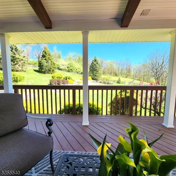 202 Fredon Springdale Rd, Fredon Twp, NJ 07860 - wooden deck with a lawn and fence