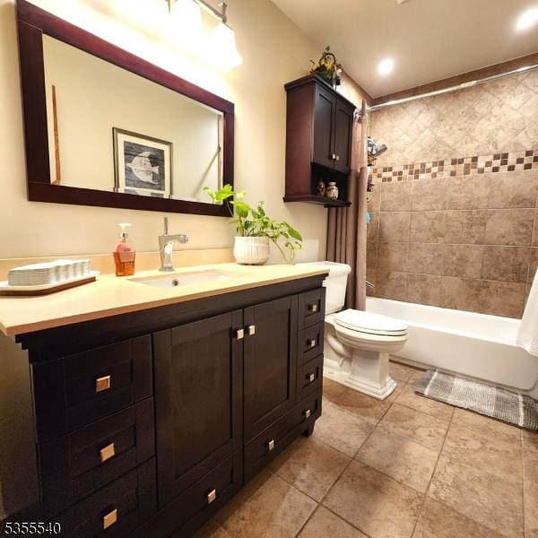 202 Fredon Springdale Rd, Fredon Twp, NJ 07860 - bathroom featuring toilet, shower / tub combo, tile patterned flooring, and vanity