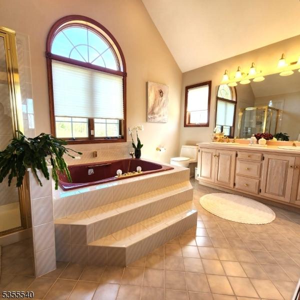 202 Fredon Springdale Rd, Fredon Twp, NJ 07860 - full bath with a sink, a shower stall, tile patterned flooring, a garden tub, and double vanity