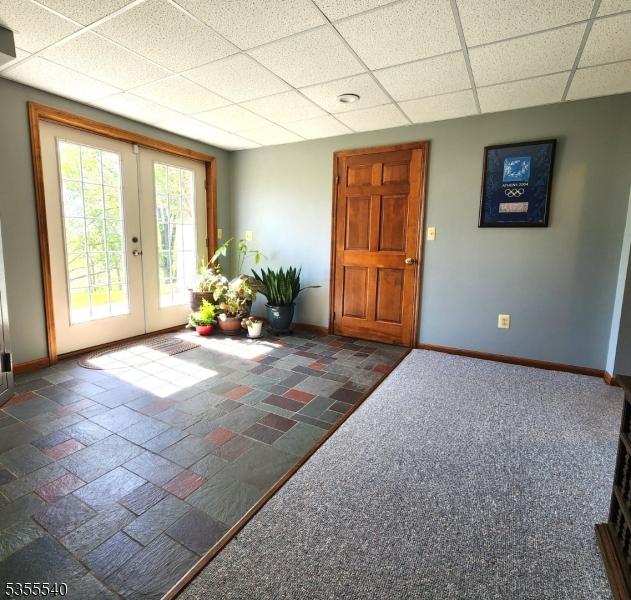 202 Fredon Springdale Rd, Fredon Twp, NJ 07860 - entryway with baseboards, french doors, and a drop ceiling