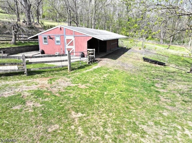 202 Fredon Springdale Rd, Fredon Twp, NJ 07860 - view of outdoor structure featuring a wooded view, an outbuilding, and an exterior structure