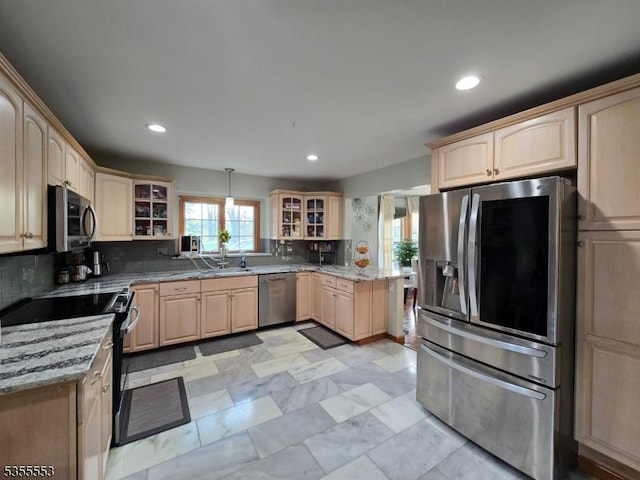 133 River Rd, Montague Twp, NJ 07827 - kitchen with appliances with stainless steel finishes, light brown cabinetry, a sink, glass insert cabinets, and recessed lighting