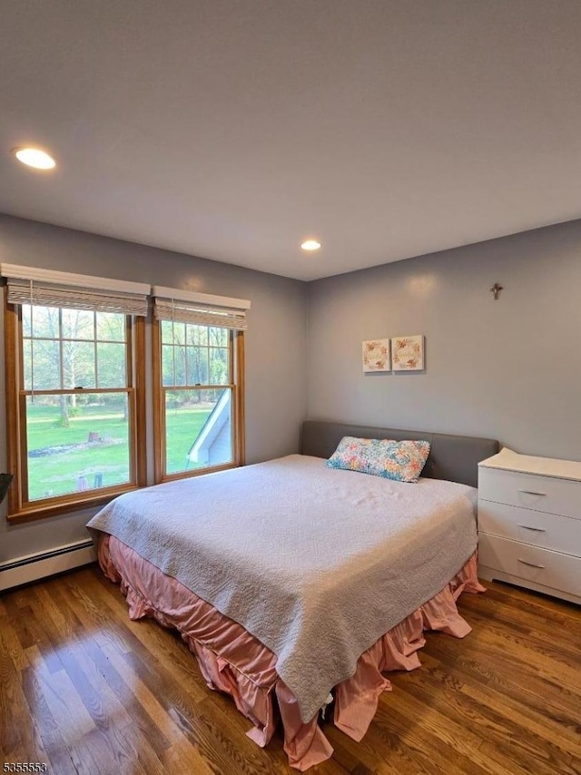 133 River Rd, Montague Twp, NJ 07827 - bedroom with wood finished floors, recessed lighting, and baseboard heating