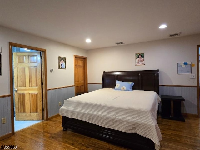 133 River Rd, Montague Twp, NJ 07827 - bedroom featuring a wainscoted wall, wood finished floors, and recessed lighting