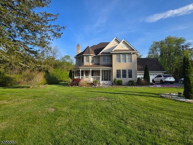 133 River Rd, Montague Twp, NJ 07827 - view of front of home featuring a chimney, a front lawn, a porch, and a garage