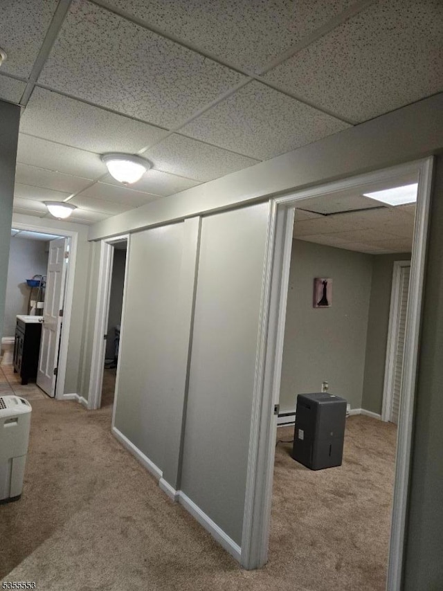 133 River Rd, Montague Twp, NJ 07827 - corridor with carpet floors, a drop ceiling, and baseboards