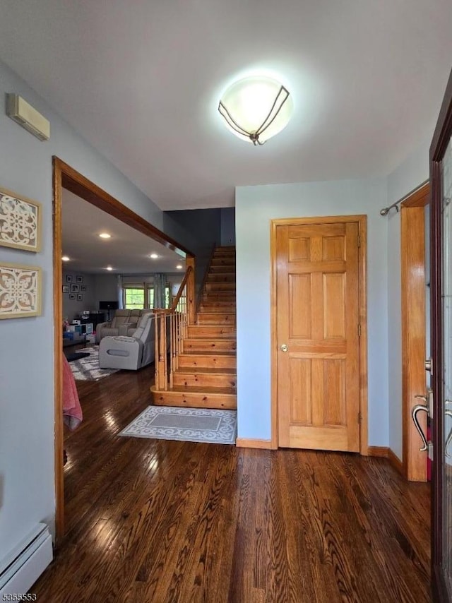 133 River Rd, Montague Twp, NJ 07827 - entrance foyer featuring baseboard heating, wood finished floors, and stairs