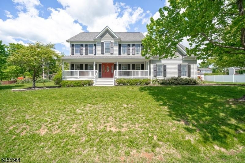 15 Bedminster Ter, Bedminster Twp, NJ 07921 - colonial-style house featuring covered porch
