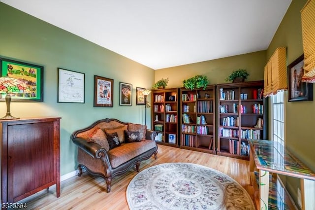 sitting room featuring wood finished floors and baseboards