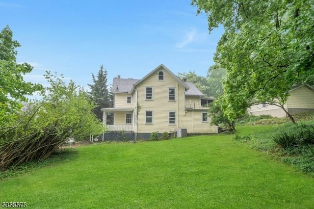 29 S Valley Rd, West Orange Twp, NJ 07052 - rear view of property with a lawn
