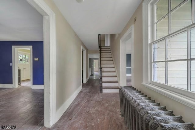 29 S Valley Rd, West Orange Twp, NJ 07052 - corridor featuring wood finished floors, baseboards, and stairway