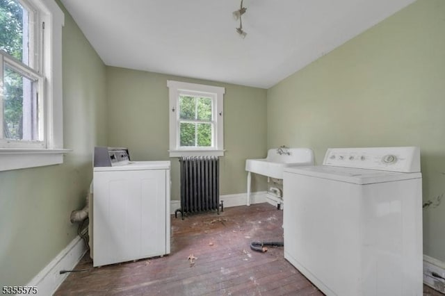 29 S Valley Rd, West Orange Twp, NJ 07052 - washroom with radiator, washer and dryer, hardwood / wood-style flooring, and baseboards