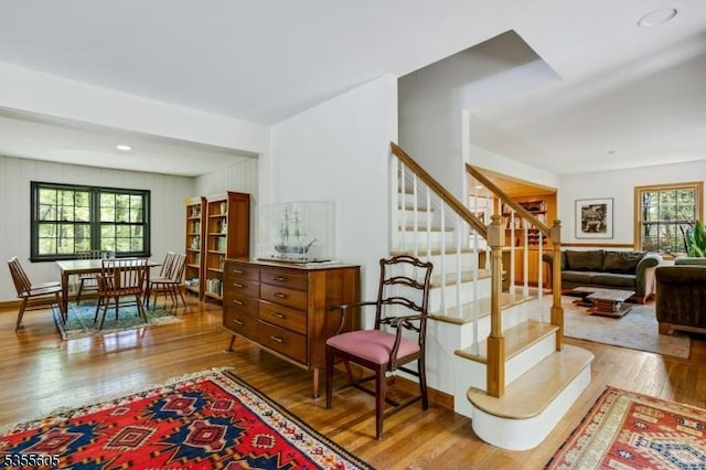 stairs with wood finished floors