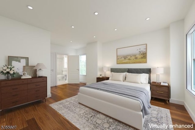 bedroom with dark wood-style flooring, multiple windows, recessed lighting, and ensuite bathroom