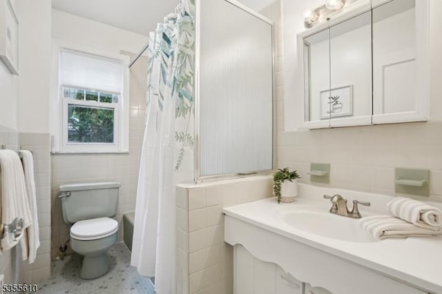full bathroom with tile walls, toilet, vanity, and a shower with curtain