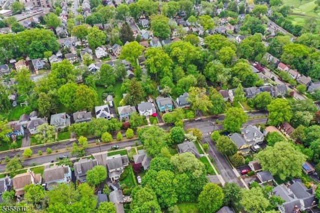 aerial view of property's location featuring nearby suburban area