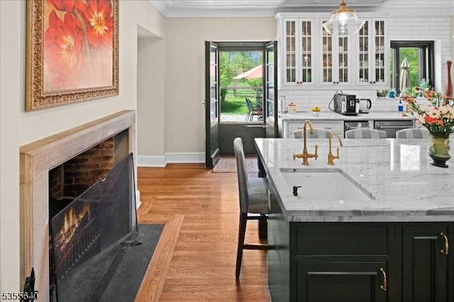 1330 Great Rd, Montgomery Twp, NJ 08540 - kitchen with a sink, dark cabinetry, crown molding, white cabinets, and baseboards