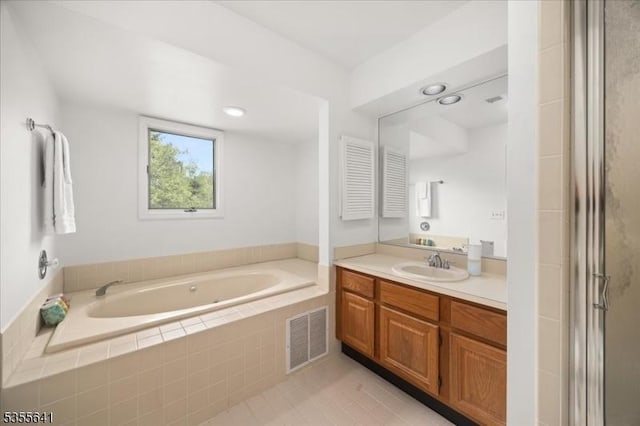 102 Westchester Ter, Clinton Twp, NJ 08801 - full bath featuring a bath, vanity, tile patterned floors, and a stall shower