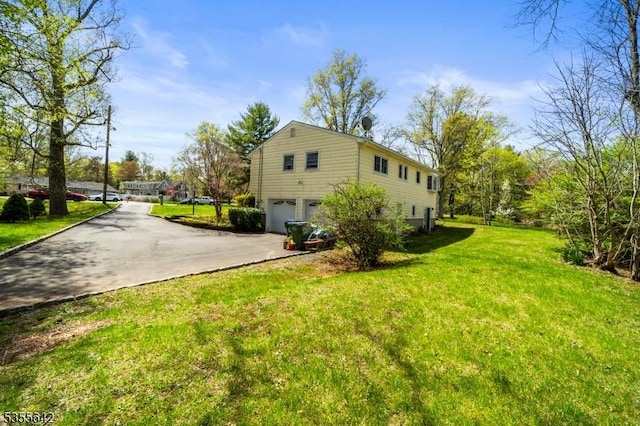 6 Lynwood Dr, Lebanon Boro, NJ 08833 - view of home's exterior featuring a garage, driveway, and a yard