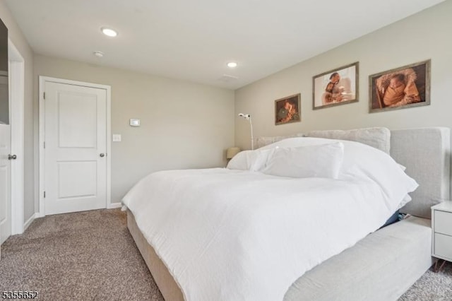 bedroom with recessed lighting, baseboards, and carpet floors