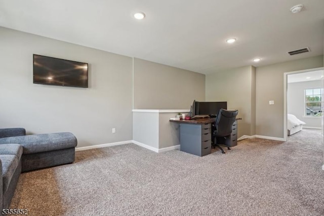 home office featuring carpet floors, baseboards, visible vents, and recessed lighting