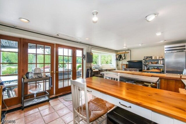 40 Hemlock Ave, Andover Twp, NJ 07860 - dining area with french doors and light tile patterned flooring