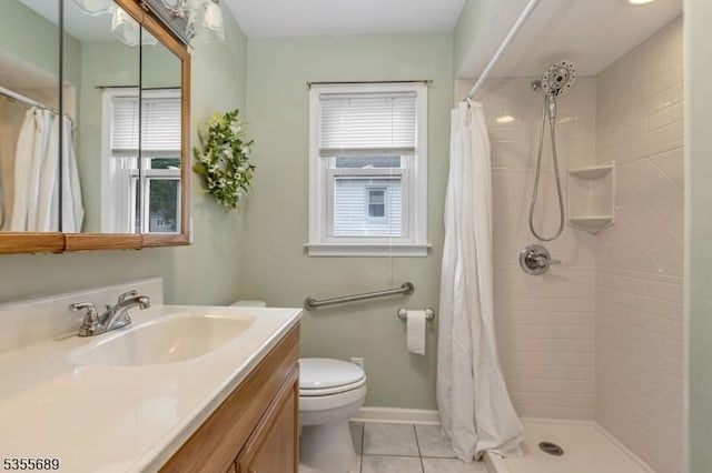 130 Coriell Ave, Fanwood Boro, NJ 07023 - bathroom with healthy amount of natural light, tile patterned floors, vanity, and toilet