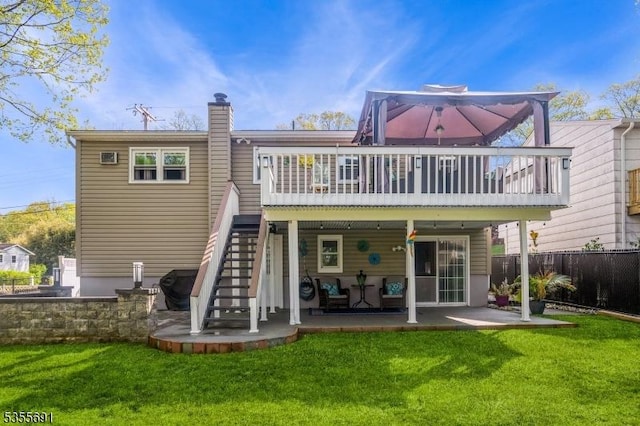 10 Tulsa Trl, Hopatcong Boro, NJ 07843 - back of property featuring a patio, fence, a lawn, and stairs