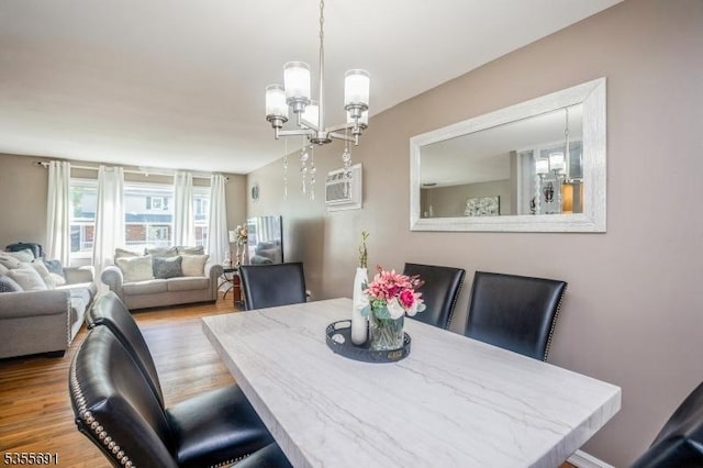 10 Tulsa Trl, Hopatcong Boro, NJ 07843 - dining area with a notable chandelier and wood finished floors