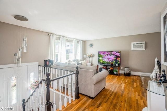 10 Tulsa Trl, Hopatcong Boro, NJ 07843 - living area featuring wood finished floors and a wall unit AC