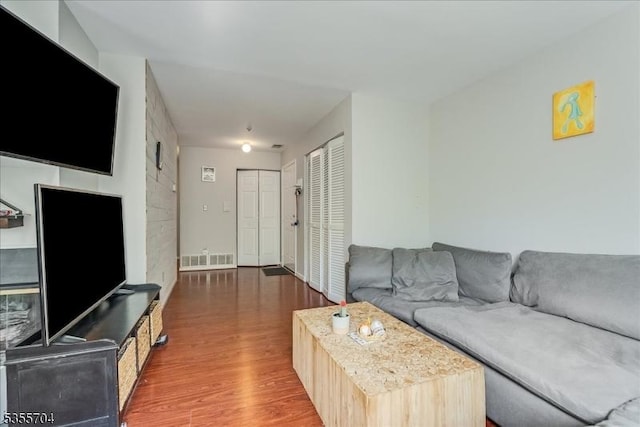 81 Village Dr Unit 81, Morris Twp, NJ 07960 - living area with visible vents and wood finished floors