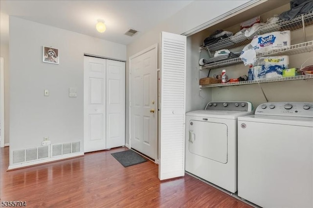81 Village Dr Unit 81, Morris Twp, NJ 07960 - clothes washing area with laundry area, visible vents, independent washer and dryer, and dark wood finished floors