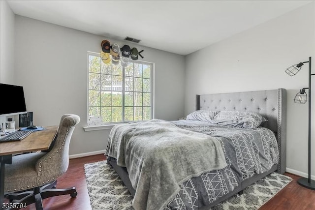 81 Village Dr Unit 81, Morris Twp, NJ 07960 - bedroom featuring baseboards, visible vents, and wood finished floors