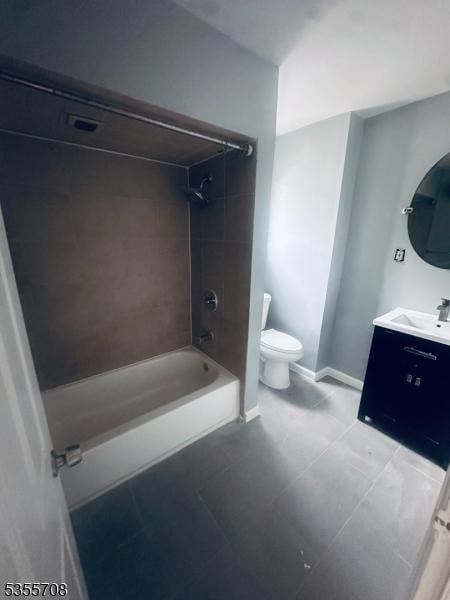 553-555 S 10th St, Newark City, NJ 07103 - full bathroom with toilet, bathtub / shower combination, vanity, and tile patterned flooring