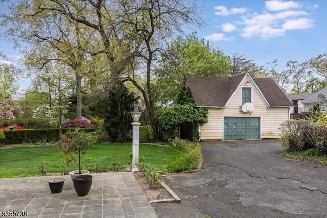 197 Nutley Ave, Nutley Twp, NJ 07110 - obstructed view of property with a front lawn, an outdoor structure, and a shingled roof
