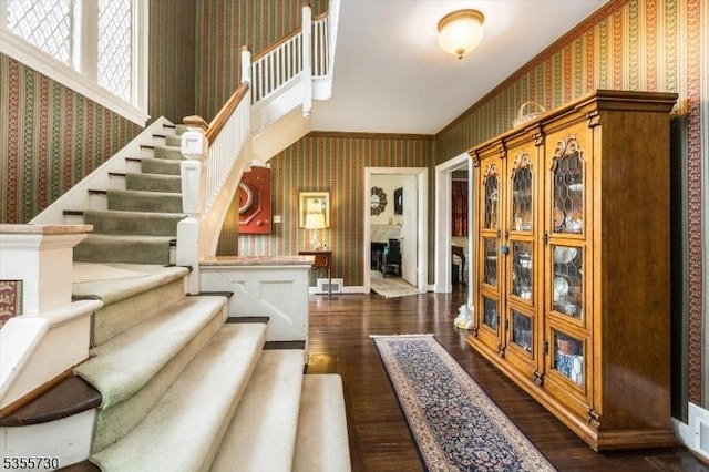 197 Nutley Ave, Nutley Twp, NJ 07110 - stairs with wallpapered walls, hardwood / wood-style floors, crown molding, and baseboards