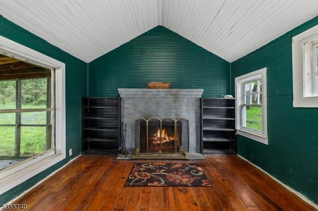 194 James St, Morris Twp, NJ 07960 - living room featuring lofted ceiling, hardwood / wood-style flooring, a brick fireplace, healthy amount of natural light, and baseboards