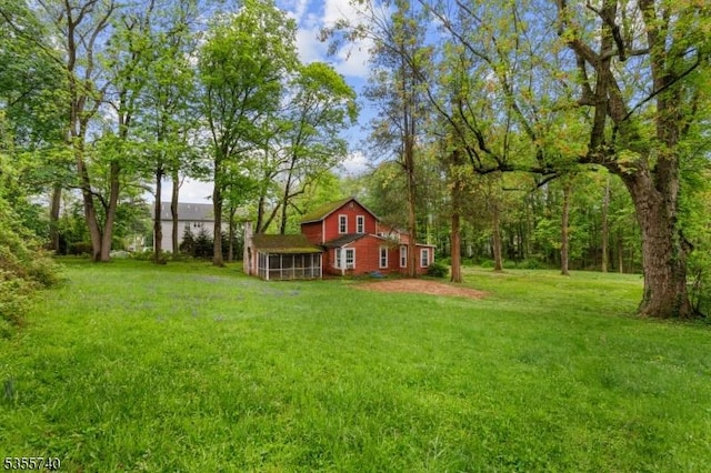 194 James St, Morris Twp, NJ 07960 - view of grassy yard with a sunroom