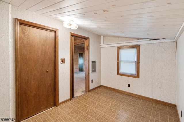 55 E Shore Culver Rd, Frankford Twp, NJ 07826 - unfurnished room featuring lofted ceiling, baseboards, brick patterned floor, and wooden ceiling