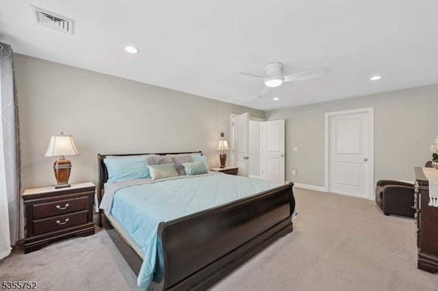 bedroom featuring light colored carpet, recessed lighting, baseboards, and ceiling fan