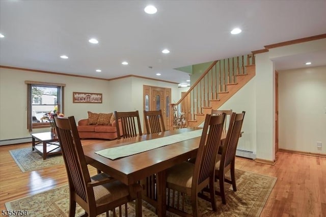 33 Lockwood Pl, Clifton City, NJ 07012 - dining area featuring ornamental molding, stairway, light wood-type flooring, baseboards, and a baseboard heating unit