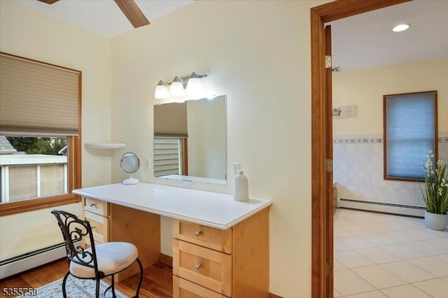 33 Lockwood Pl, Clifton City, NJ 07012 - bathroom featuring a baseboard heating unit, tile walls, recessed lighting, vanity, and tile patterned floors
