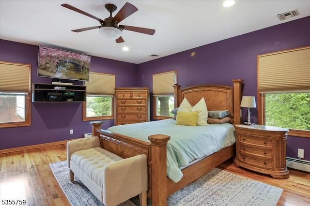 33 Lockwood Pl, Clifton City, NJ 07012 - bedroom with multiple windows, wood finished floors, recessed lighting, and baseboards