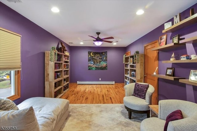 33 Lockwood Pl, Clifton City, NJ 07012 - living area with baseboard heating, recessed lighting, ceiling fan, and wood finished floors