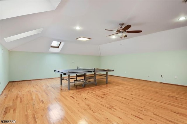 33 Lockwood Pl, Clifton City, NJ 07012 - recreation room with a skylight, vaulted ceiling, light wood-type flooring, recessed lighting, and ceiling fan