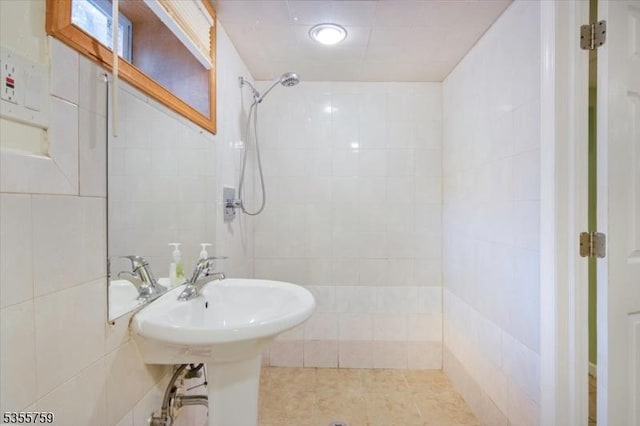 33 Lockwood Pl, Clifton City, NJ 07012 - full bathroom featuring a tile shower, tile walls, and tile patterned floors