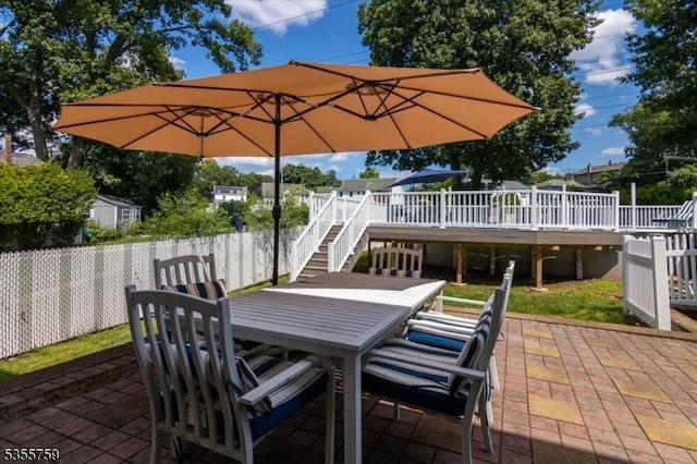 33 Lockwood Pl, Clifton City, NJ 07012 - view of patio with outdoor dining space, a deck, stairs, and fence