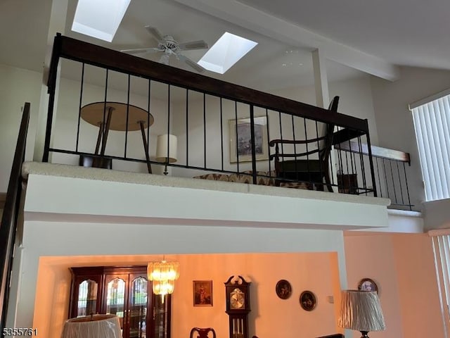 87 Sycamore Ct, Bernards Twp, NJ 07920 - detailed view of a skylight, beamed ceiling, a chandelier, and ceiling fan